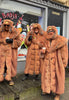 People wearing vintage fur coats during Aalst Carnaval in Belgium