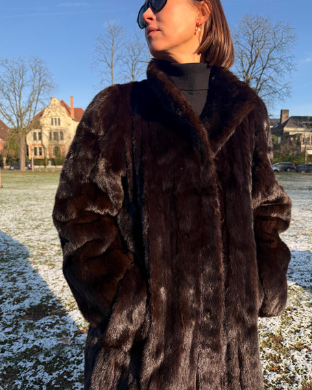 Vintage mink and sable fur coats in natural brown tones