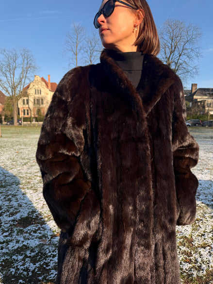 Vintage mink and sable fur coats in natural brown tones