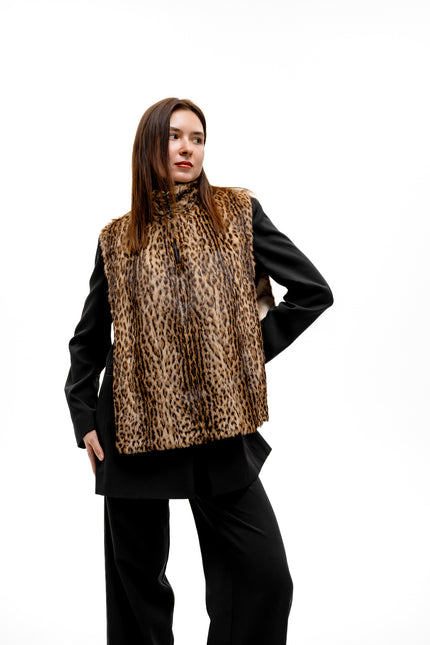 Upcycled leopard print fur turtleneck vest styled as a sleeveless winter layering piece
