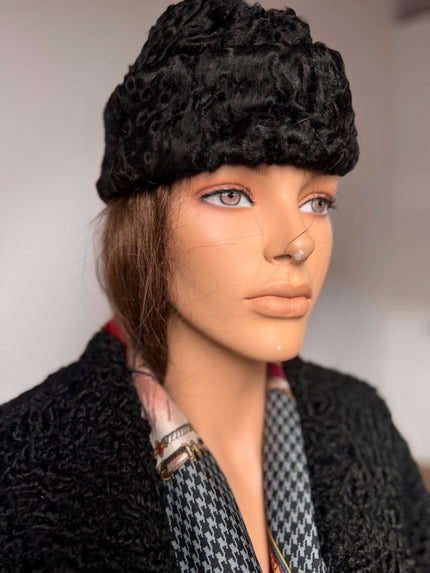 Vintage black Astrakhan fur hat made from genuine karakul lamb fur
