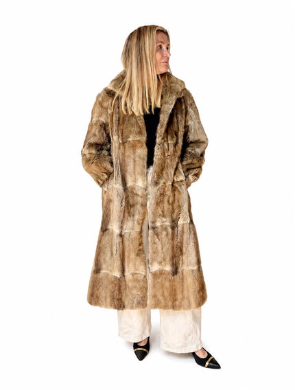 Long brown vintage muskrat fur coat made from genuine fur